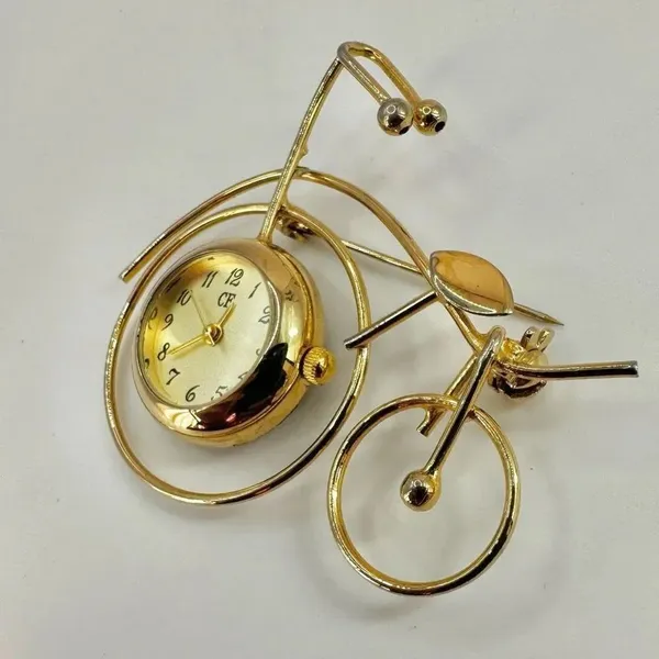 CF Gold tone watch bicycle brooch - Image 4
