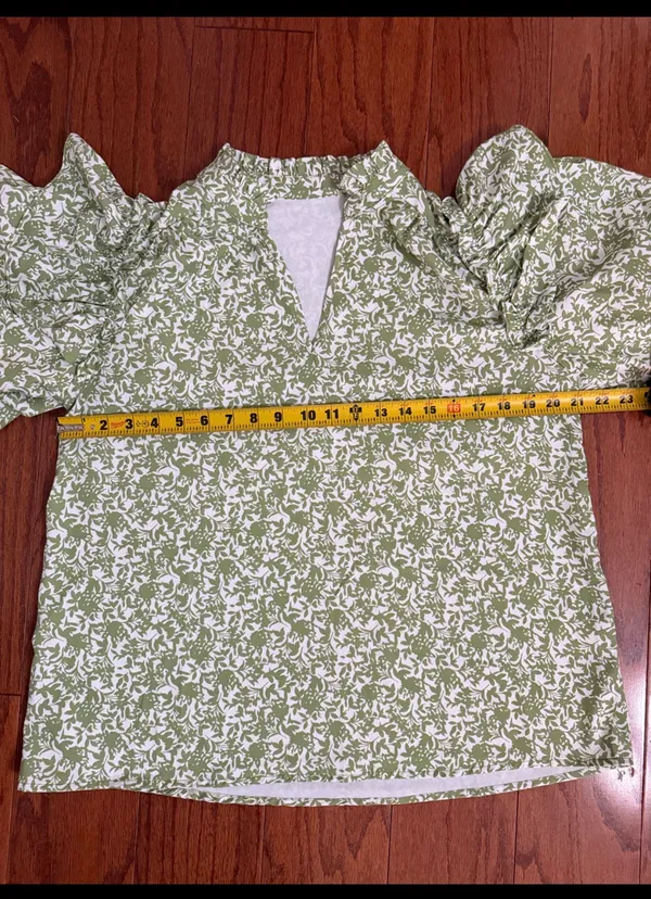 Green & white floral Boho Blouse with ruffled Puff sleeves- Size Medium. ***Refer to measurements. Gently warn and excellent condition. Measurements approximately 21” x 24” long. Material is 100% polyester. Non-smoking home . Priced at as is condition. Don’t like my price make a reasonable offer! And thank you for checking my closet! - Image 6