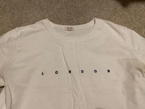 Brandy Melville “London” White Baby Tee - Image 2