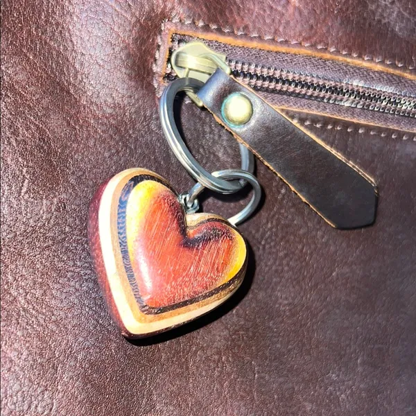 Antonio Valeria is a former Spacious Brown Leather Tote with Minimalist Design - Image 11