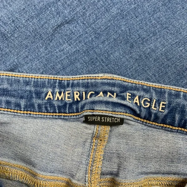 American Eagle Super Hi-Rise Flare Jeans Blue Distressed Raw Hem Women 10‎ Reg - Image 6