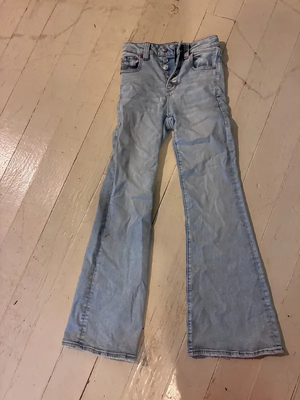 American Eagle Super High-Rise Light-Wash Flare Jeans - Image 2