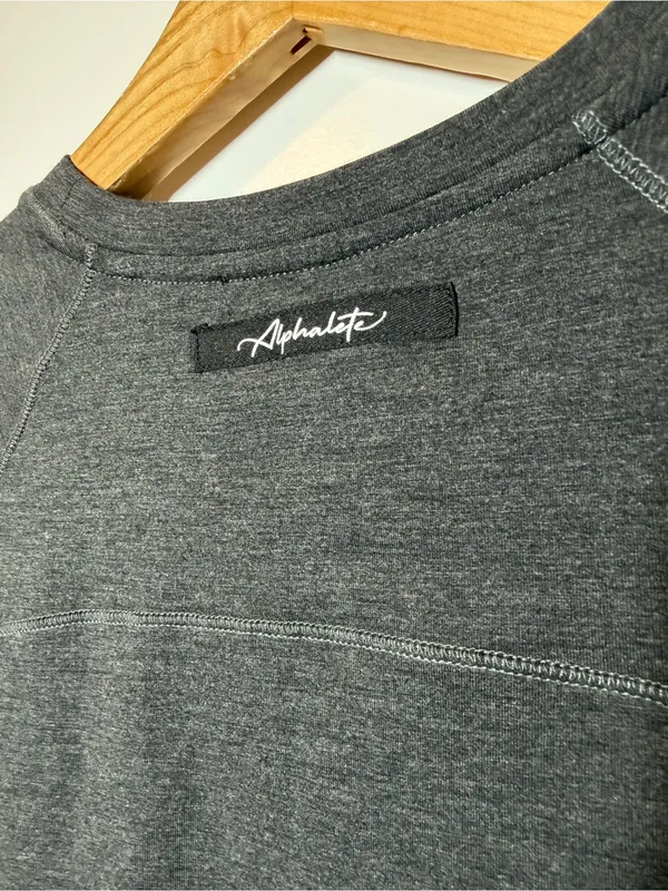 Alphalete Stratus Long Sleeve Crop Top in Charcoal Grey - Image 6