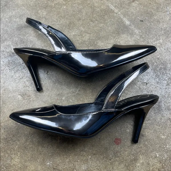 Calvin Klein Metallic Slingback Heels
Size: 9 - Image 3