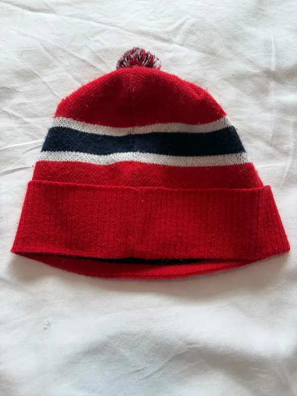 Swix Red Pom Beanie with Navy & White Flag Detail - Image 3