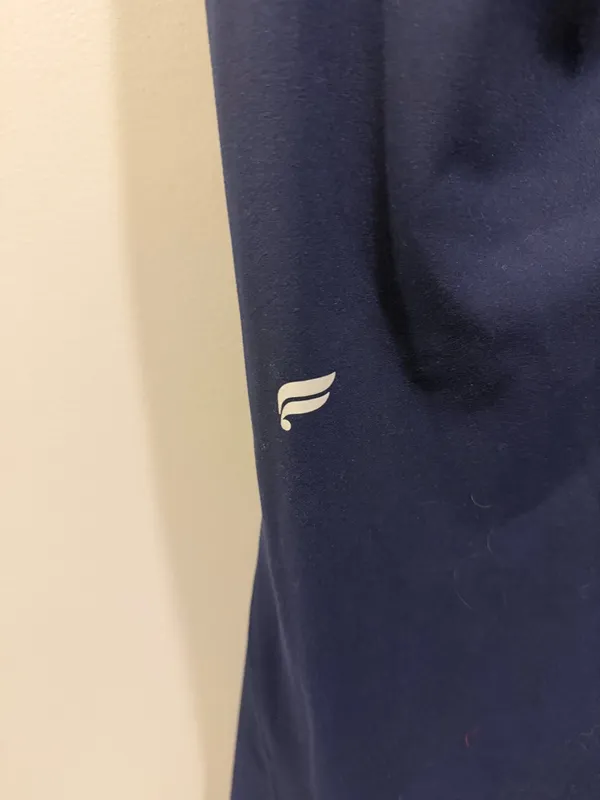 Fabletics Oasis PureLuxe High-Waisted Crossover Flare Leggings Navy - Image 7