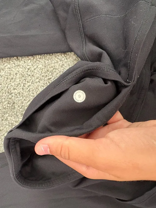 Black Lululemon leggings with an adjustable waistband - Image 2