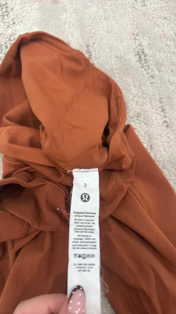 Lululemon Fast and Free High-Rise Tights in the color Dark Terracotta or Butternut Brown. - Image 4