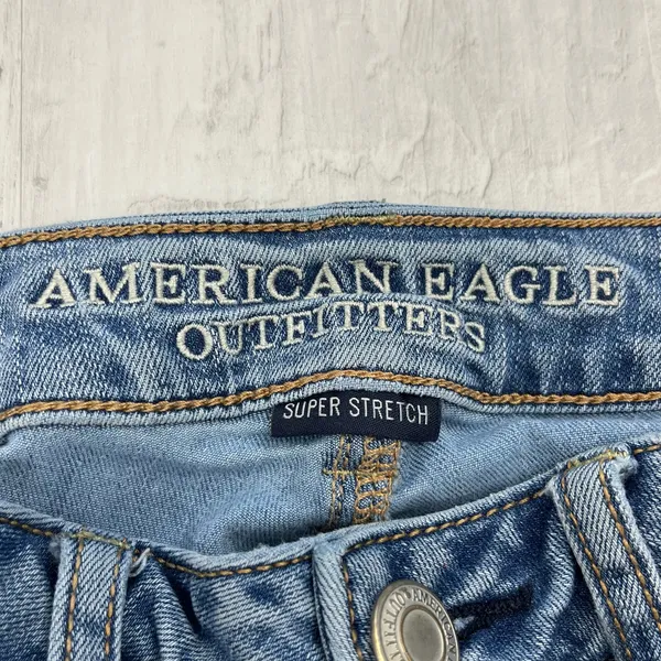 American Eagle Super Stretch Mid Rise Light Wash Distressed Skinny Jeans 6S - Image 4