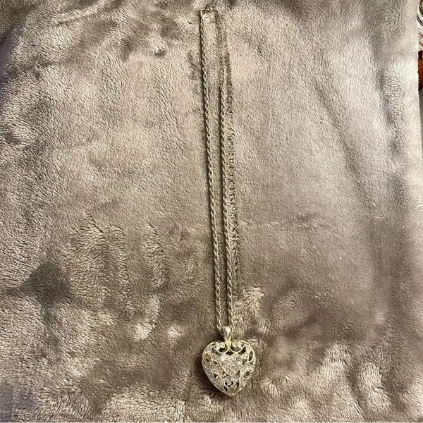 Silver colored heart locket necklace filled with rhinestones in the front side - Image 3