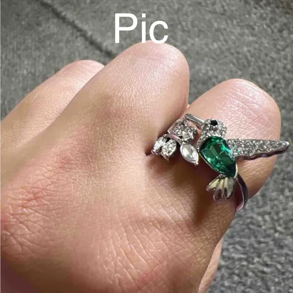 Elegant Silver Tone Hummingbird Rhinestone Ring with Green Gemstone - Image 4