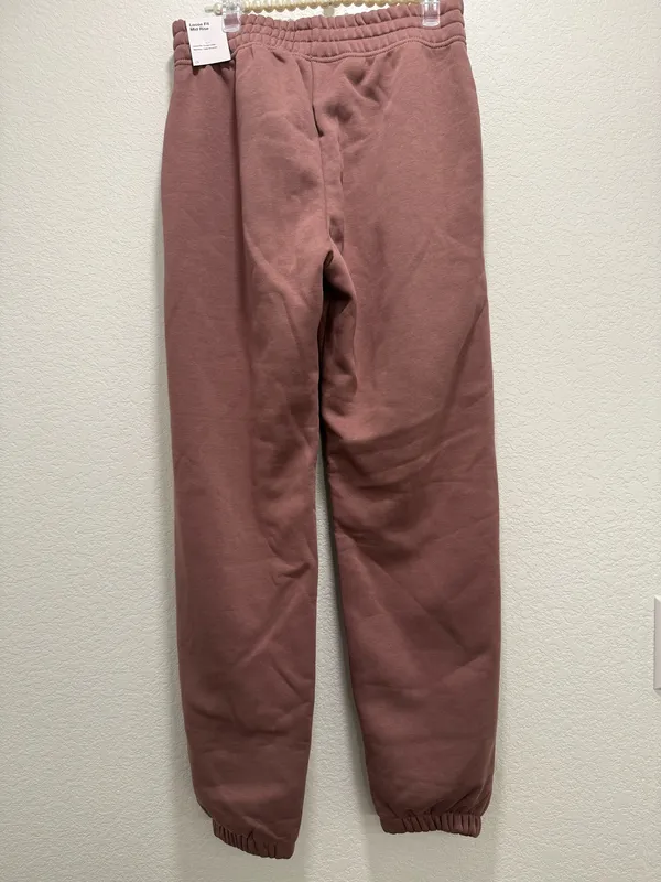 Pink Nike sweatpants with black logo - Image 5