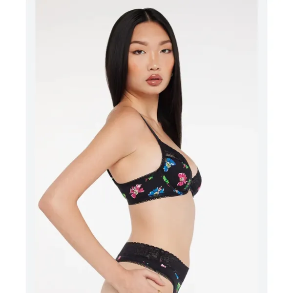 Savage X Fenty Cotton Essentials Unlined Bra Lace Bad Butterfly Black Size S Breathable Fabric: Soft and stretchy signature cotton-jersey body construction for comfortable, all-day lounge or streetwear wear.Unlined Support: Features lightweight, unlined 3-layer underwire cups and supportive wings designed to hug and lift your natural shape without extra bulk.Signature Details: Finished with delicate, tonal scalloped logo lace trim running along the cups.Custom Fit: Features fully adjustable shoulder straps and a classic hook-and-eye back closure with tonal nylon-coated hardware.Materials: Body is 95% Cotton, 5% Elastane; Delicate Lace trim is 82% Polyamide, 18% Elastane.Care Instructions: Hand wash cold, lay flat to dry. - Image 4