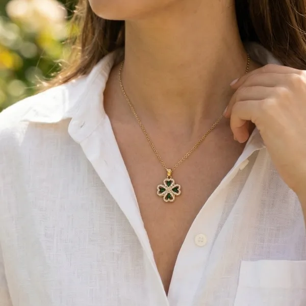Elegant Gold Necklace with Four Leaf Pendant with Green Stones - Image 2