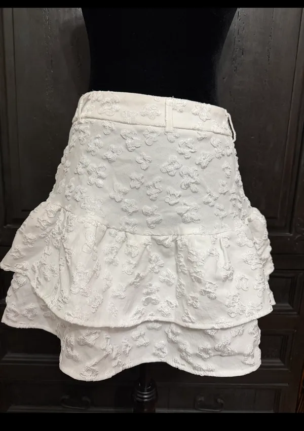 SHEIN ruffle trim skirt textured fabric with a tiered ruffles - size Medium. ***Refer to measurements. Beautiful skirt to wear out on a party trip. Fun & spunky. MOD jacquard ruffle trim skirt features a textured fabric with a tiered, ruffled hem and a button closure. Measurements approximately 15” waste x 16” long. Non- smoking home. priced to sell at as is condition. Don’t like my price, make reasonable offer! And thank you for checking my closet. - Image 2