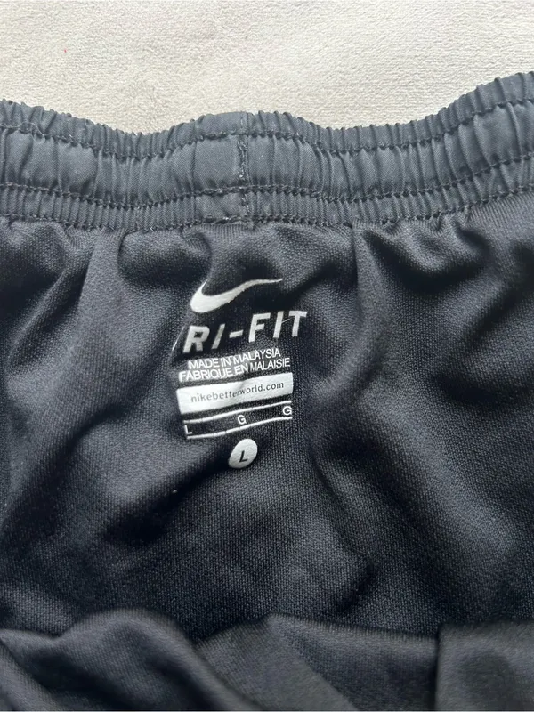 Nike Women’s Black Athletic Running Shorts with White Trim - Image 2