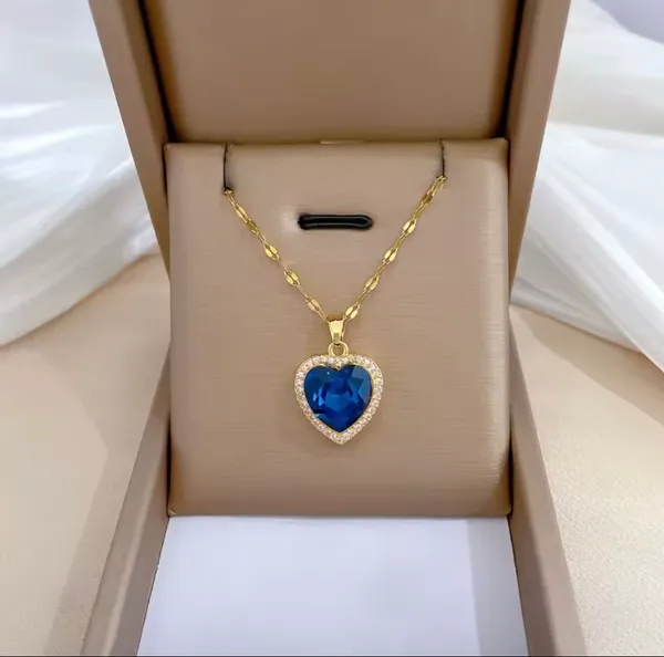 Gold necklace with blue heart - Image 2
