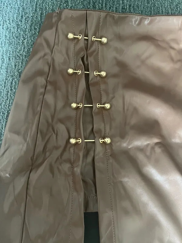 Faux leather brown skirt with gold accents - Image 2