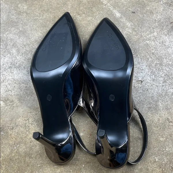 Calvin Klein Metallic Slingback Heels
Size: 9 - Image 4