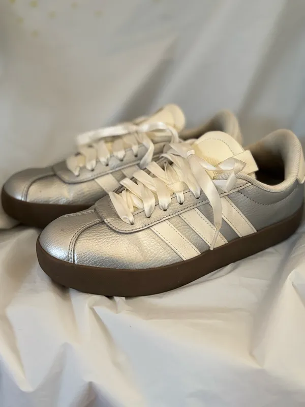 adidas Women’s Silver Metallic Sneakers with White Stripes and Brown Gummy Sole - Image 2