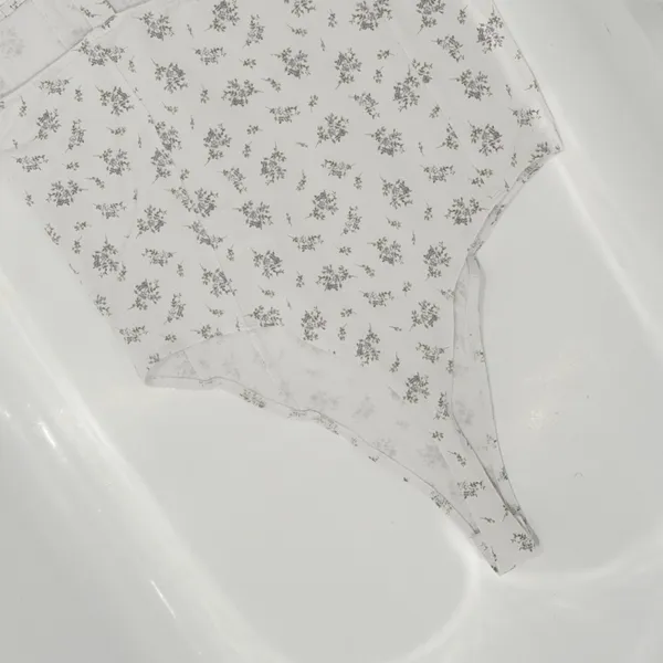 H&M Jersey Thong Bodysuit size Medium Print is lavender small flowers - Image 10