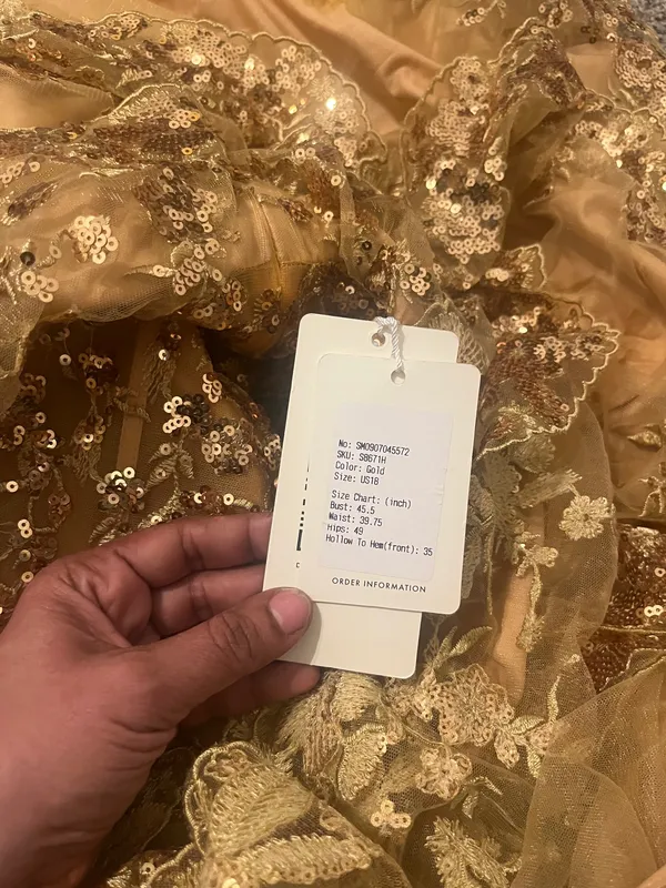 Stacees Shine in this elegant gold lace dress, perfect for any special occasion. The intricate lace detailing adds a touch of sophistication. - Image 9