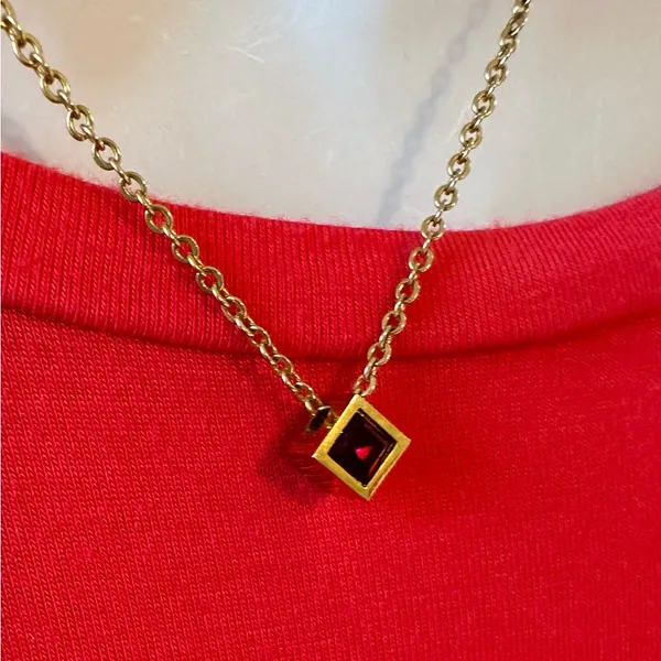 Beautiful Gold Necklace with a Ruby Colored Stone - Image 2