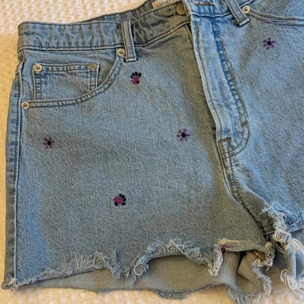 Lucky Brand 12/31 Pins Blue Denim Cut Off Jean Shorts Embroidered Purple Flower - Image 4