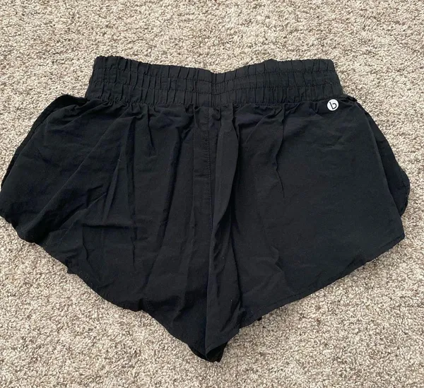 Cotton on body size medium shorts with built in biker shorts - Image 2
