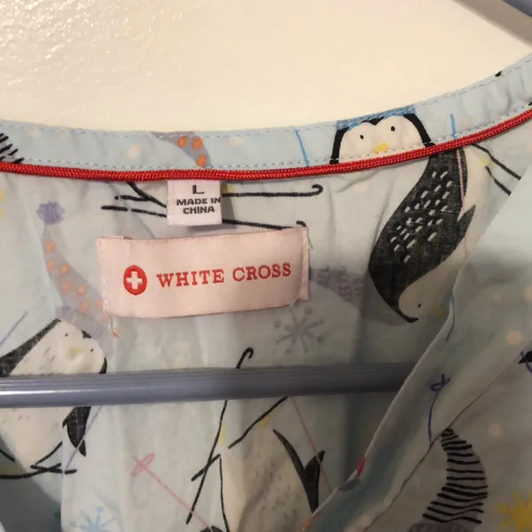 White Cross Penguin Women’s Large Blue Color Scrub Top - Image 2