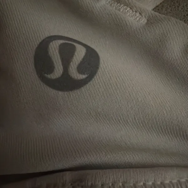 white lulu sports bra! barely worn, great condition! size 0! comes with pads! originally $48, selling for $25! ! - Image 3