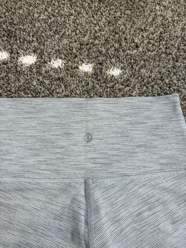 White and Gray Lululemon Wunder Under Leggings - Image 4