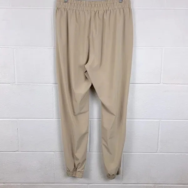 Aritzia Tna women’s speed tan high waisted joggers performance athletic size L - Image 3