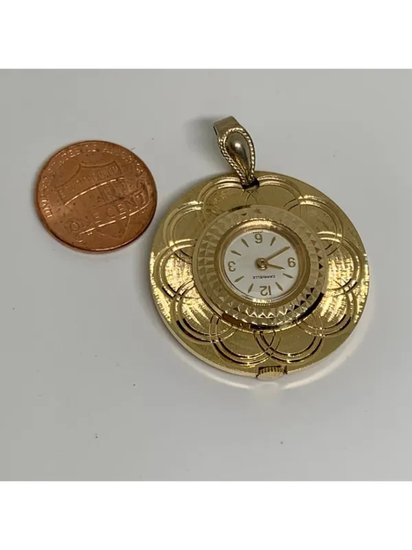 Vintage Caravelle by Bulova women Mechanical Pendant Watch gold tone 33mm works - Image 6