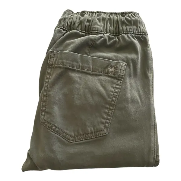 American Eagle -ARMY GREEN JOGGER PANTS-SIZE 2 Elastic waist with drawstring, zip front, two front and two back pockets, elastic ankles with a side zipper, excellent condition Measurements: Waist: side to side 13-16 inches Rise: 9 inches Inseam: 37 inches - Image 2