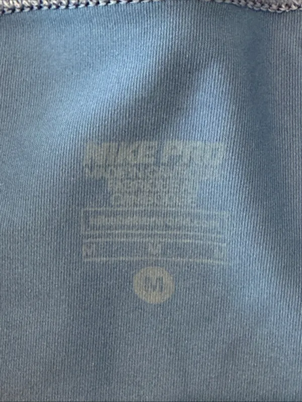 Nike Blue Compression Shorts with Black Waistband and Yellow Swoosh - Image 8