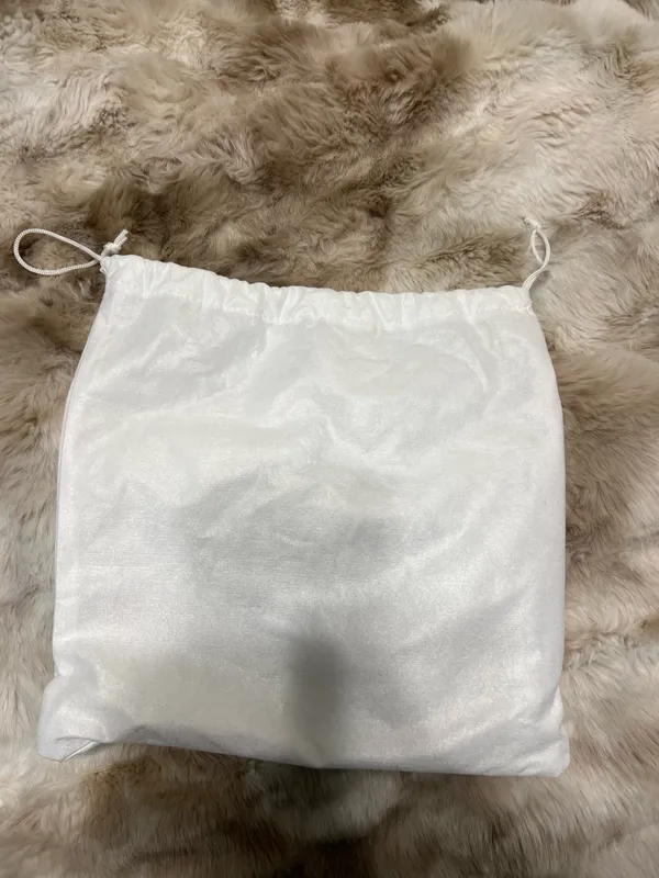 Elegant Prada dust bag in white. Perfect for storing luxury items. - Image 2