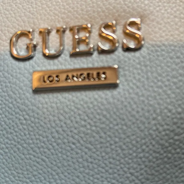 GUESS. Lt blue color! PURSE Vogue lanky chain handle! Near new. - Image 6