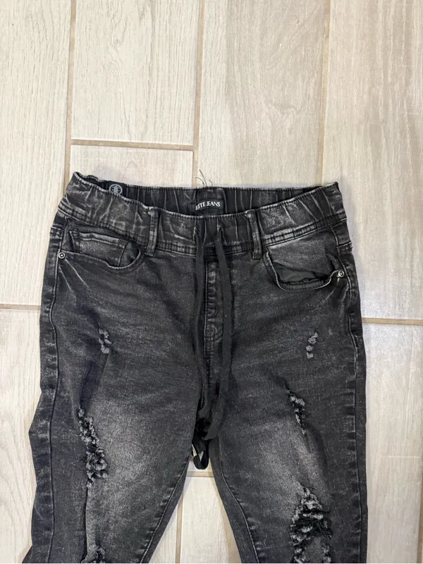 High-Rise Distressed Skinny Jeans in Washed Black - Image 4