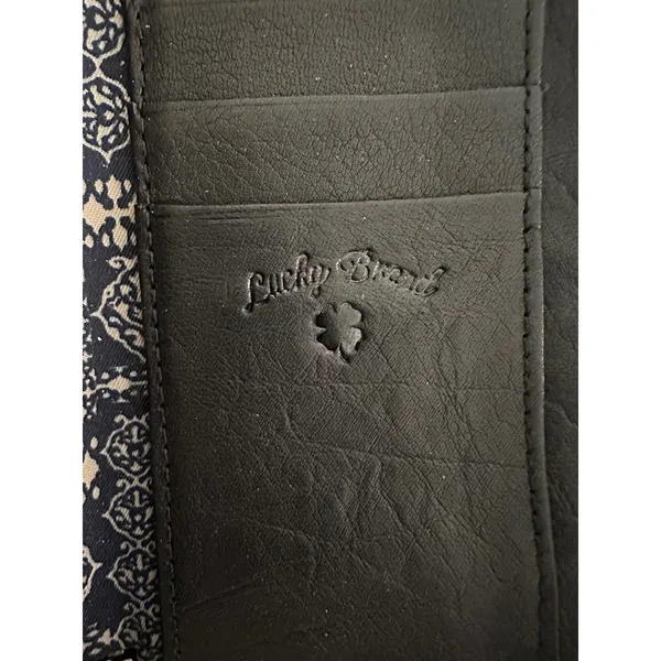 Lucky Brand black leather zip-around wallet with a gold‎ plate detail - Image 7