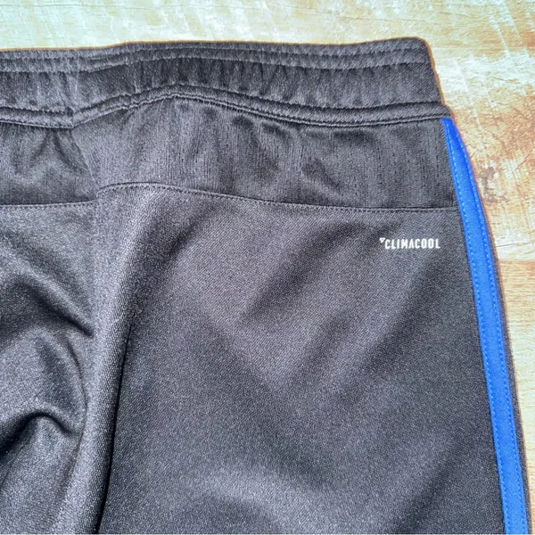 Adidas Black Track Pants with Red, White, and Blue Accents and Pockets - Image 3