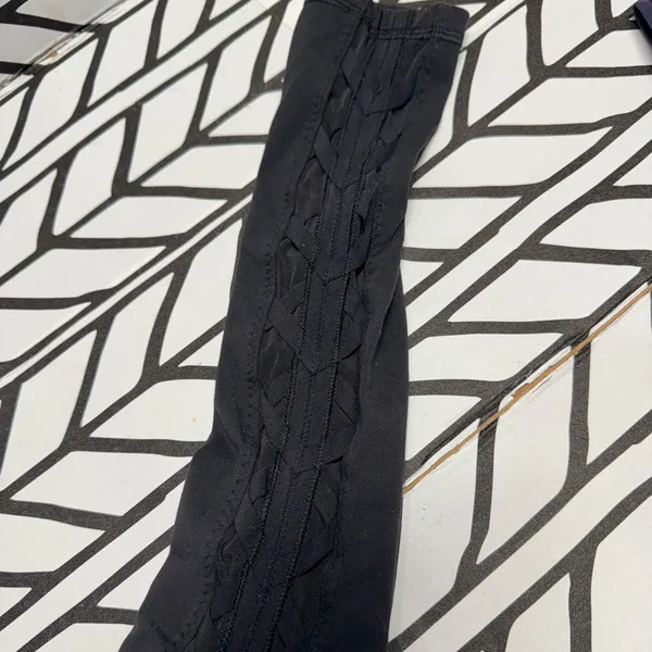 Lululemon Black Leggings with Sheer side panels with Criss Cross details- size 2 - Image 2