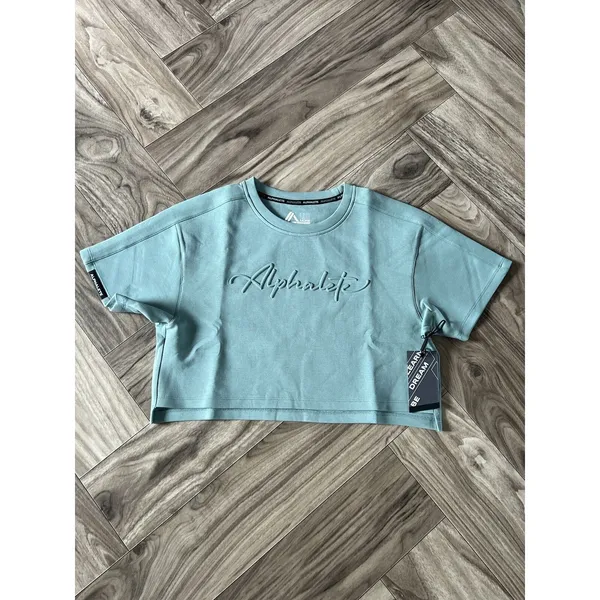 Alphalete Woman’s ELMTS Short SLEEVE Crop - Teal , Size XS - Image 3