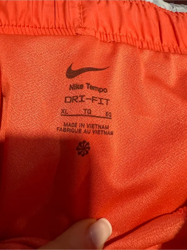 Nike Women's Coral Athletic Shorts with White Swoosh - Image 5