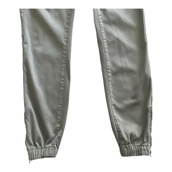 American Eagle -ARMY GREEN JOGGER PANTS-SIZE 2 Elastic waist with drawstring, zip front, two front and two back pockets, elastic ankles with a side zipper, excellent condition Measurements: Waist: side to side 13-16 inches Rise: 9 inches Inseam: 37 inches - Image 3