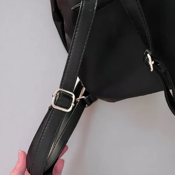 Black Glitter Faux Leather Mini Backpack with Pom-Pom Charm & Zippered Pockets - Image 10