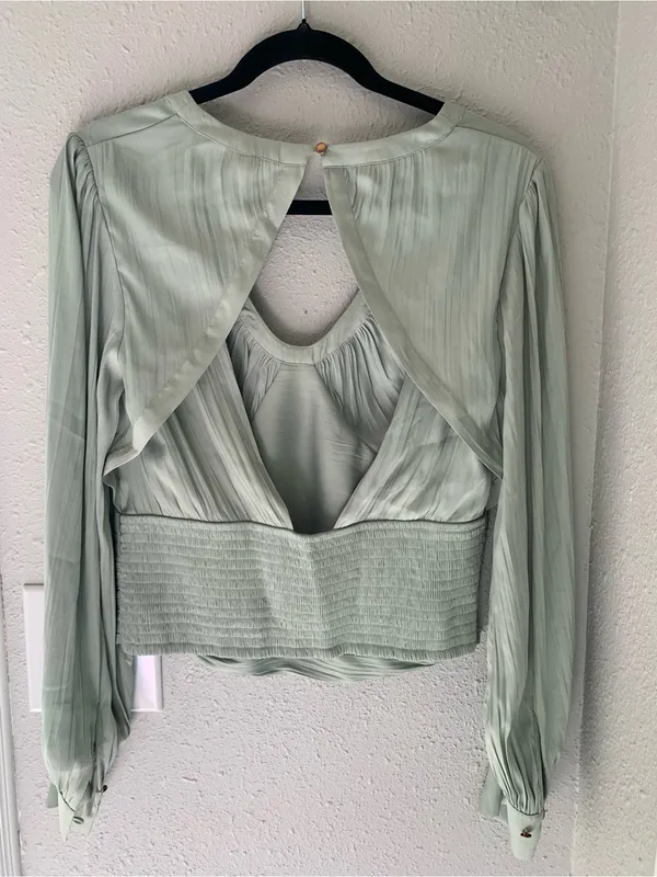 Anthropologie blouson-sleeve blouse is featured in a silky, sage-green fabric. - Image 9