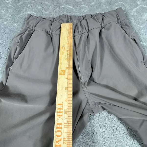Vuori Miles Ankle Pants Women XS Chia Brown Tapered Joggers Zip Pocket Travel - Image 11