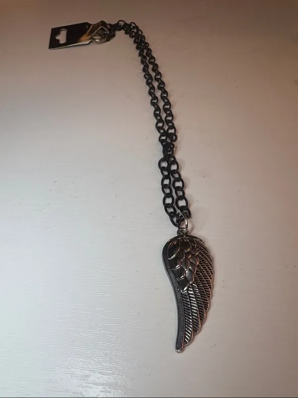 Amanda Sanchez black cabin Silver Tone Wing Pendant Necklace - Image 4