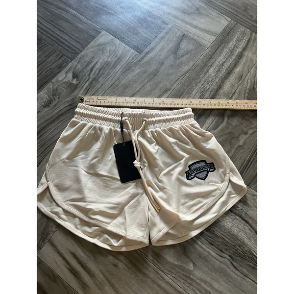 NEW Alphalete Woman’s Varsity Short - Tan ,size XS - Image 11